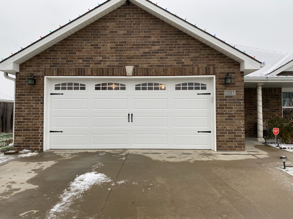 Classic white carriage house garage door in Blue Springs, MO